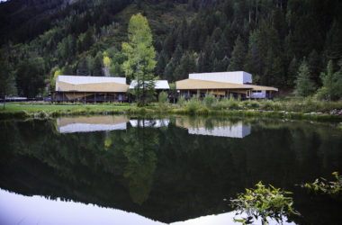 arts buildings reflected in pond