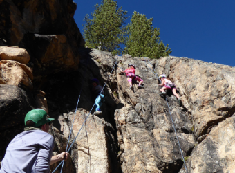 Third Graders climbing with ropes and guides