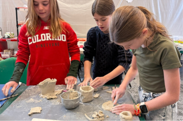 Middle School students making clay pots in art class at Aspen Country Day School