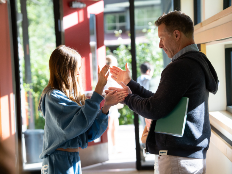A Middle School leader connects with students at Aspen Country Day School, where learning is powered by strong relationships
